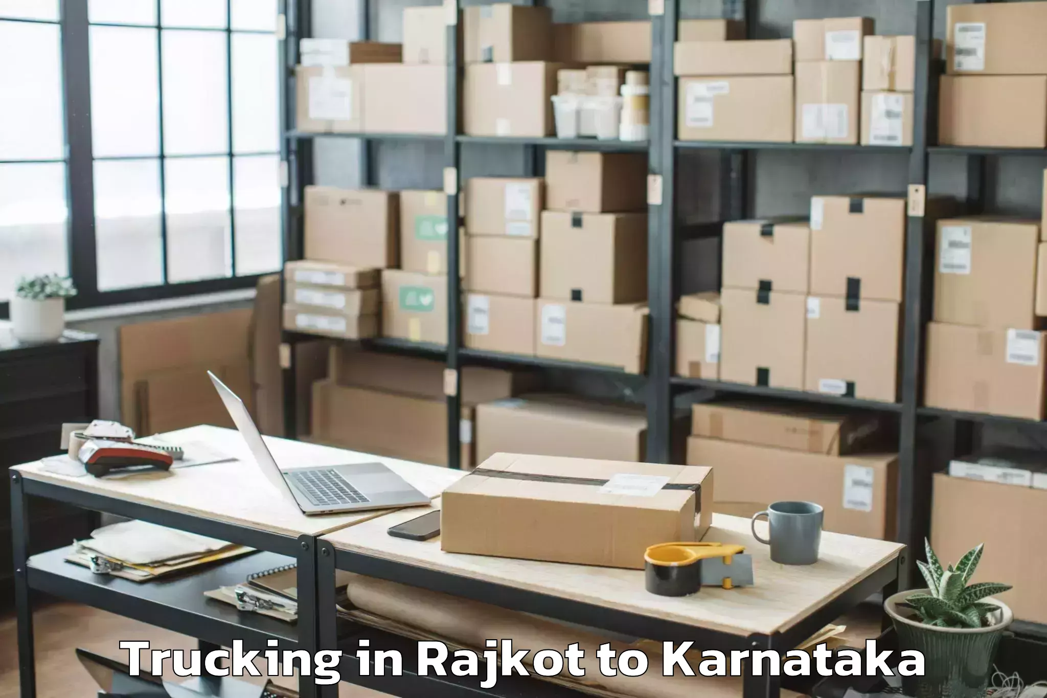 Book Rajkot to Visvesvaraya Technological Uni Trucking Online